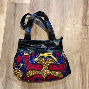 Brand new cloth and vinyl handbag by Sanray.
